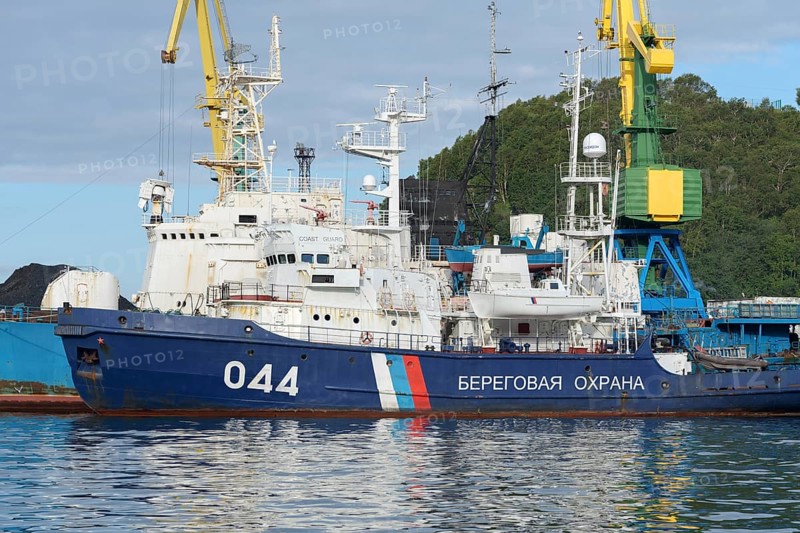 Russian warships Coast Guard of Border Guard Service of Russian FSB anchored at pier in sea port of Petropavlovsk-Kamchatsky City. Pacific Ocean, Kamchatka Peninsula, Russian Far East, 5 Sep, 2018
