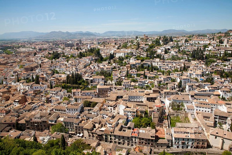 View of historic Moorish buildings in the Albaicin district of Granada, Spain seen from the Alhambra