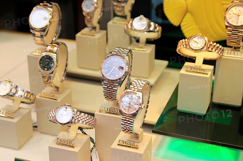 Winsor Bishop jewellery shop window display of expensive Rolex watches, Norwich, Norfolk, England, UK