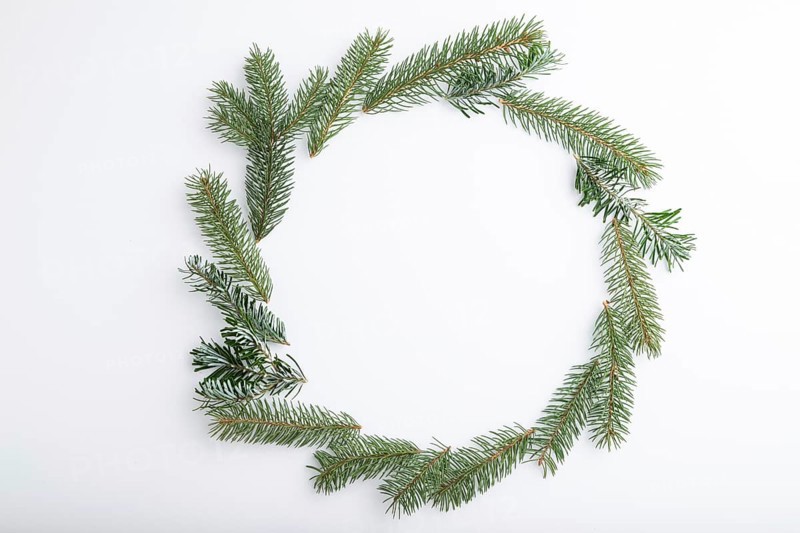Christmas or New Year wreath composition. Decorations, fir and spruce branches, on white background. Top view, copy space, flat lay
