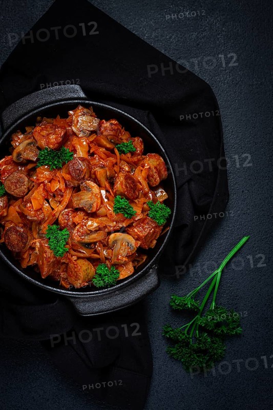 Bigos, bigus is a national Polish dish, made of cabbage and meat, stewed, homemade, no people