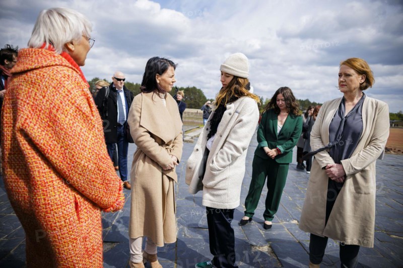 Visit to the Sachsenhausen Concentration Camp Memorial on the occasion of the 'Äô Youth Remembers 'Äô programme. Annalena Bärbock (Alliance 90/The Greens), Federal Foreign Minister, talks to a participant in the presence of Claudia Roth (Alliance 90/The Greens), Minister of State for Culture and the Media, and Lisa Paus (Alliance 90/The Greens), Federal Minister for Family Affairs, Senior Citizens, Women and Youth. Oranienburg, 23.04.2024. Photographed on behalf of the Federal Foreign Office