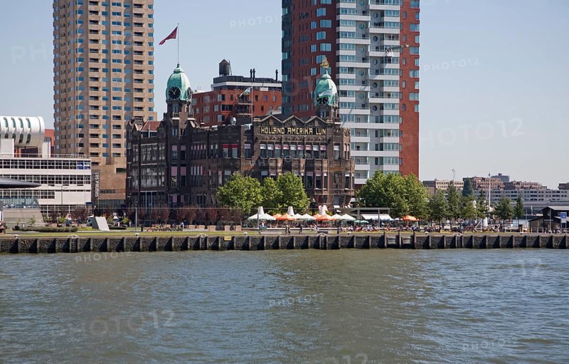 Historic Hotel New York building dwarfed by modern skyscrapers, Rotterdam, Netherlands