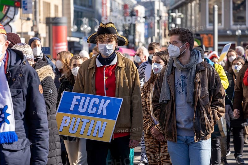 Peace demonstration against the war in Ukraine, instead of the Rose Monday parade in Cologne, with over 250, 000 participants, in the city centre, with many carnivalists, North Rhine-Westphalia, Germany, Europe