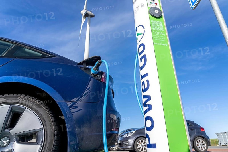 Electric car fast charging station, from the Dutch provider PowerGo, in the ferry harbour of Eemshaven, powered by renewable energy, Netherlands