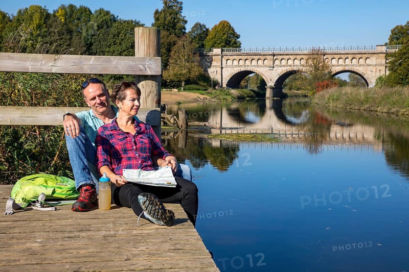 Hikers in the Steverauen Olfen, Alte Fahrt canal bridge, of the Dortmund-Ems Canal, a renaturalised floodplain landscape and a local recreation area in the north of Olfen, Hohe Mark Westmünsterland nature park Park, North Rhine-Westphalia, Germany, Europe