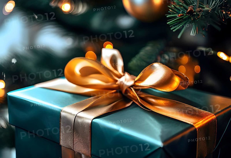 Close-up of a beautifully wrapped Christmas gift with a satin ribbon, set under a glowing Christmas tree, AI generated
