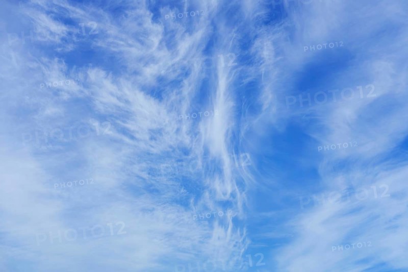Blue sky with cirrus clouds, high cloud made of ice crystals in summer