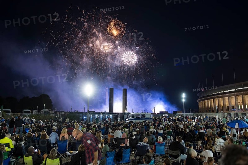 Spectators watch the fireworks at the Pyronale on the Maifeld at the Olympic Stadium, Berlin, 30/08/2024