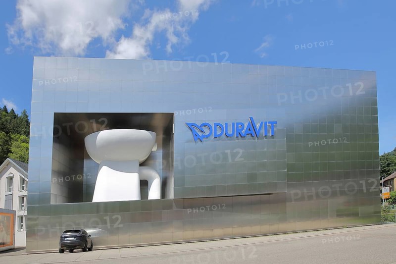 Modern building of Duravit-AG with oversized toilet bowl, oversize, XXL, size comparison, car, corporation, company, inscription, landmark, emblem, logo, Hornberg, Ortenau, Southern Black Forest, Black Forest, Baden-Württemberg, Germany, Europe