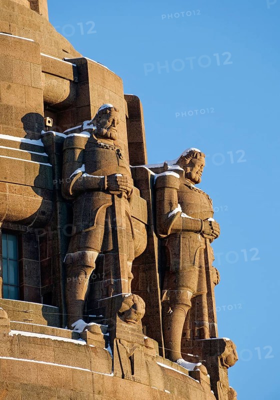 Guardian figures, Völkerschlachtdenkmal on a winter's day with snow, Leipzig, Saxony, Germany, Europe