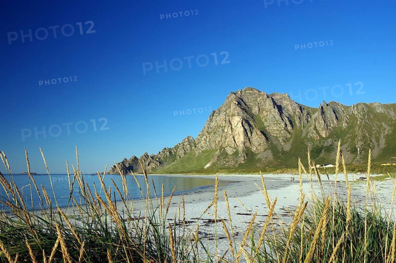 Island in the sea with calm sandy beach and blue sky with clouds, Bleik, Vesteralen, Langoya, Nordland, Norway, Europe