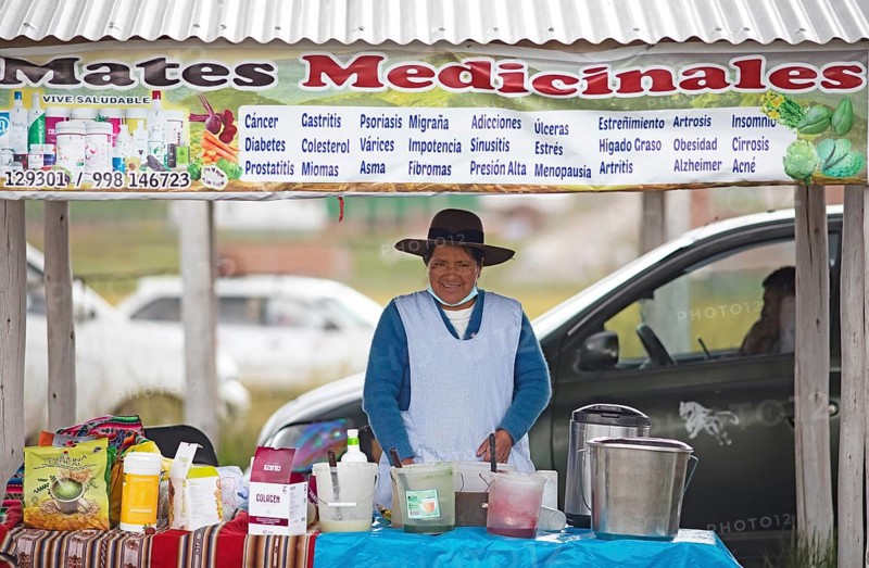 Peruvian woman sells medicine against cancer and diabetes at the indigenous market in Chinchero, Cusco region, Peru, South America