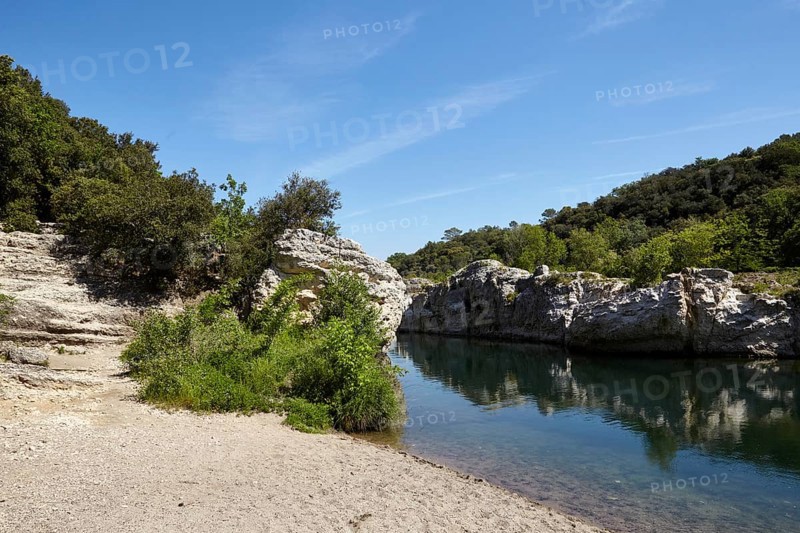 The river Céze with limestone cliffs near La Roque-sur-Cèze, Département Gard, Occitania region, France, Europe