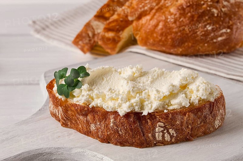 Sandwich, with cream cheese, homemade, on a cutting board, rustic style, no people, selective focus, breakfast