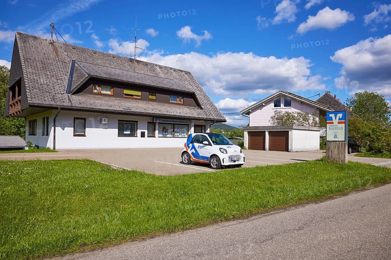 Volksbank Rhein-Wehra eG, branch with car park and car in the Innerlehen district, Bernau im Black Forest, Black Forest, Waldshut district, Baden-Württemberg, Germany, Europe