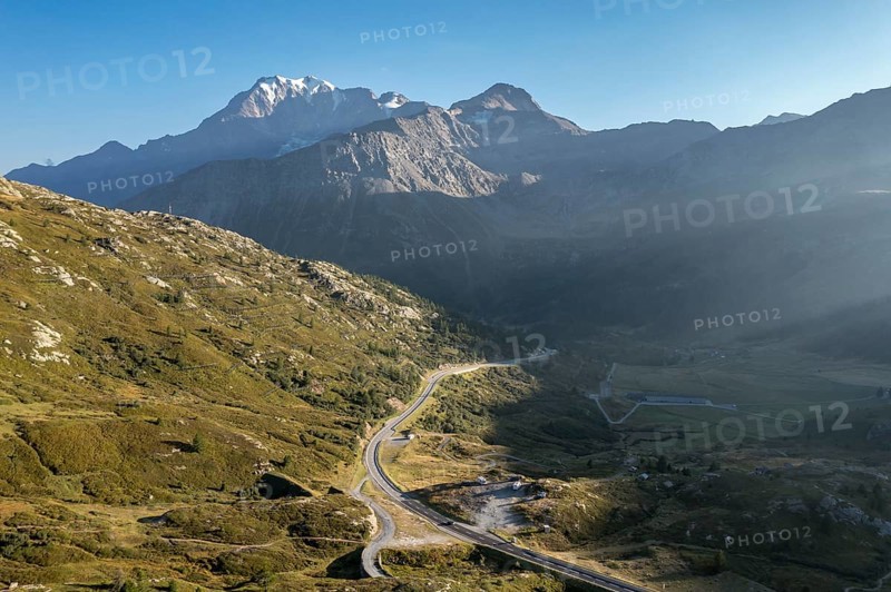 Aerial view of Simplon mountain pass, drone shot, camper vans park near old Spittel, Switzerland, Europe