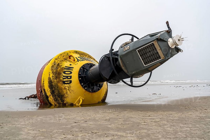 Washed up buoy, sea mark, detached in a storm, originally off the island of Norderney in the North Sea, Wadden Sea World Heritage Site, North Sea island of Spiekeroog, East Frisian North Sea coast, at low tide