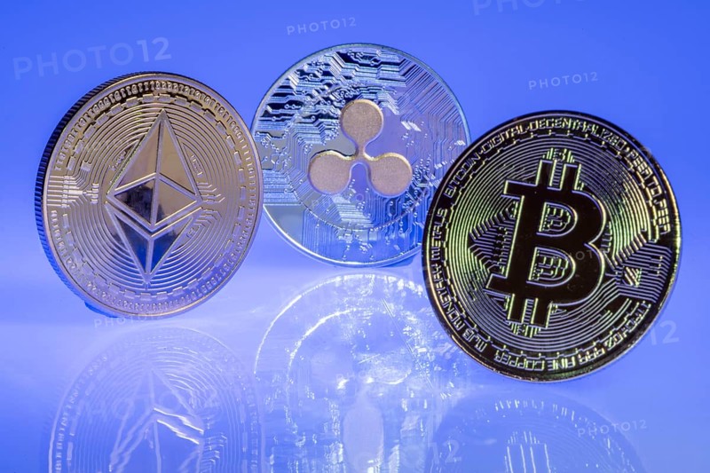 Various cryptocurrencies, symbol coins, optical placeholder for the digital currency, blockchain, Bitcoin, Ripple, Ethereum, from right to left