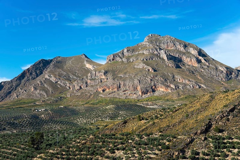 Large mountains and green hills under a clear blue sky, a picturesque example of natural beauty, Alto de la Serrezuela mountain, near Bedmar y Garcíez, Bedmar y Garciez, Sierra Mágina Natural Park, Jaén province, Jaen, Andalusia, Spain, Europe