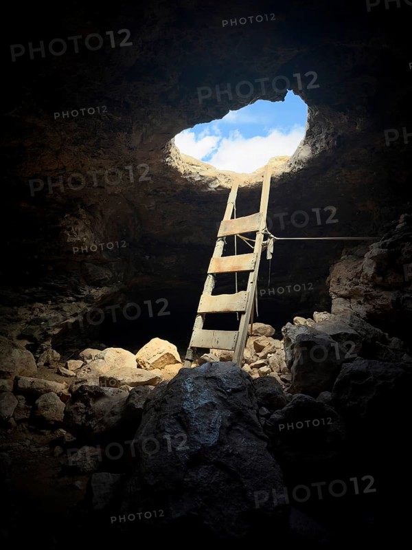 La Cova Foradada cave at the Far de Cap de Barbaria lighthouse on the southern tip of Formentera, Balearic Islands, Spain, Europe