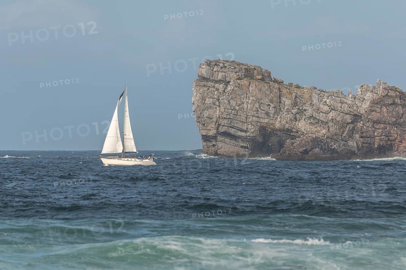Sailboat sailing offshore on the Atlantic Ocean. Camaret sur mer, Crozon, Finistere, Brittany, France, Europe