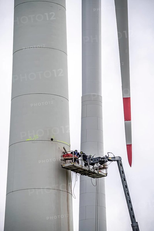 Preparation for the demolition of the tower of a 20 year old wind turbine, in the Werl wind farm, 5 old Enercon E-66 turbines are demolished, 2 new Siemens SG6.6-170 wind turbines replace them, the WTGs produce twice as much energy, 12 MW power, as the 5 old wind turbines, called repowering, Werl, North Rhine-Westphalia, Germany, Europe