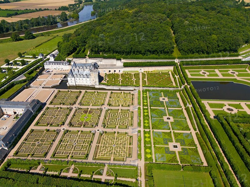 Aerial view of a castle with formal, geometric gardens consisting of labyrinths, ponds and manicured paths, aerial view, Villandry Castle, Renaissance, Tours, Loire Valley, Centre-Val de Loire, France, Europe