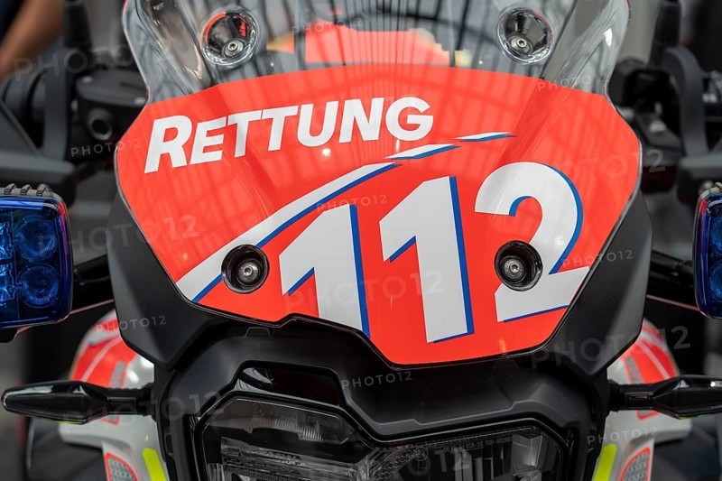 Rescue service, motorbike vehicle, inscription emergency number 112