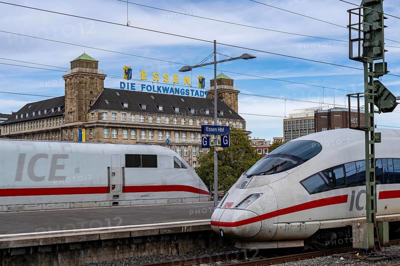 Essen main station, ICE trains on the tracks, in the background the Handelshof, city centre of Essen, North Rhine-Westphalia, Germany, Europe