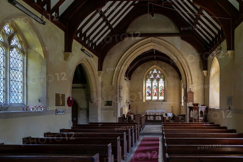 Nave chancel arch altar east window inside village parish church of Saint Mary, Boyton, Suffolk, England, UK
