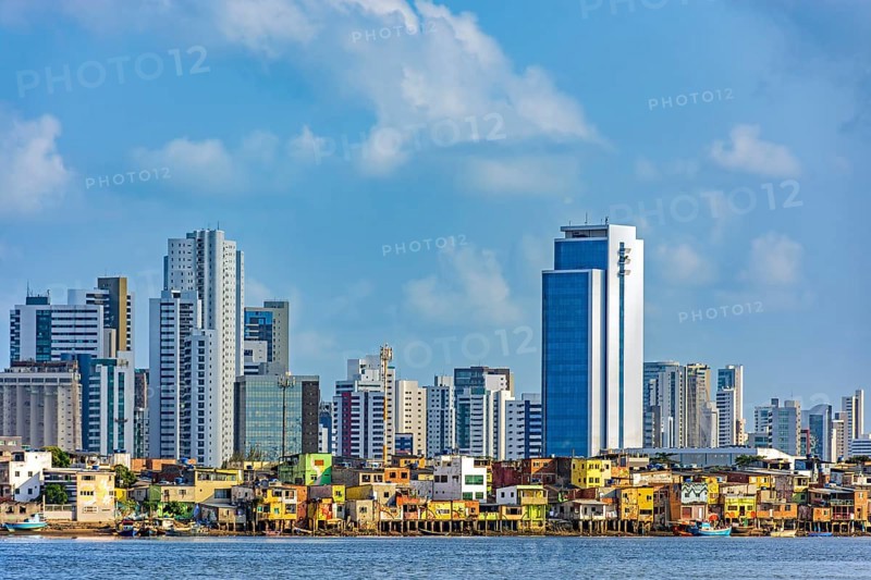 Skyscrapers in the city of Recife in Pernambuco behind the favela on the banks of the Capibaribe River, Recife, Pernambuco, Brazil, South America