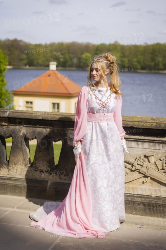 Cinderella can also be seen around Moritzburg Castle in spring. Model Tamara Kretschmer once again slipped into the coveted role of the legendary Cinderella with the ball gown, Moritzburg, Saxony, Germany, Europe