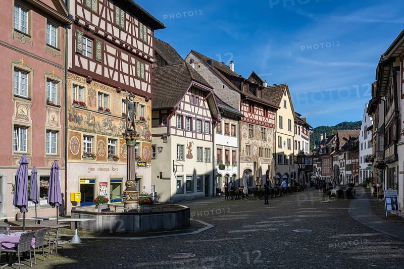 Imposing, historic half-timbered buildings with detailed facade paintings on the market square with the market fountain in the old town of Stein am Rhein, an important sight in Switzerland, Canton Schaffhausen, Switzerland, Europe