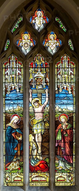Stained glass window of Crucifixion church of Saint George, Ogbourne St George, Wiltshire, England, UK by Cox, Sons, Buckley 1890