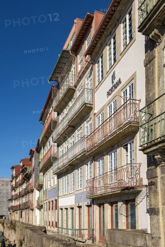 Colorful facades of houses along Cais da Estiva in the Ribeira district, Porto, Portugal, Europe