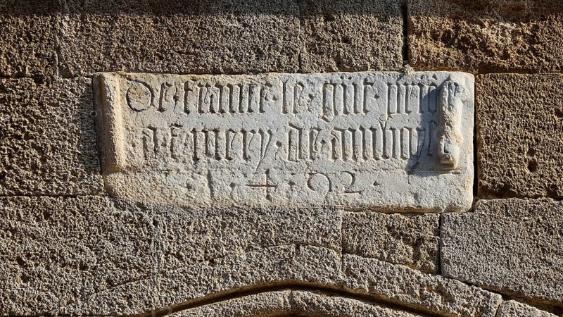 Stone slab with an engraved inscription on an old, historic wall, Knights' Street, Rhodes Old Town, Rhodes Town, Rhodes, Dodecanese, Greek Islands, Greece, Europe