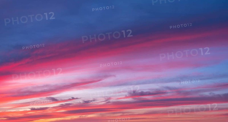 Red glowing clouds in the evening light at sunset, sunset, panorama, wallpaper, sky replacement