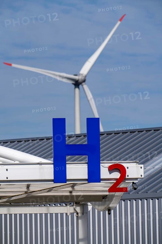Hydrogen filling station in Antwerp, for cars and lorries, H2 lettering, wind turbine in the harbour, Belgium, Europe