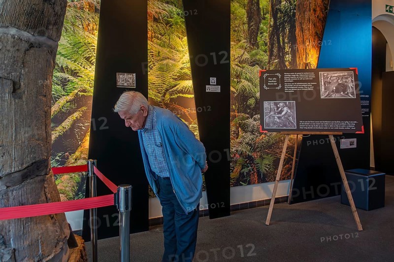 Elderly visitor in the be-MINE Mijnmuseum, coal mine museum in the city Beringen, Koersel, province of Limburg, Flanders, Belgium. Model released