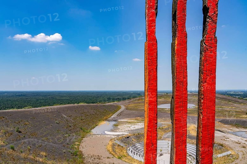 The Haniel spoil tip, 185 metre high spoil tip, at the Prosper Haniel mine, which was closed in 2019, artwork Totems by the sculptor Augustin Ibarrola, mountain arena, amphitheatre, Bottrop, Germany, Europe