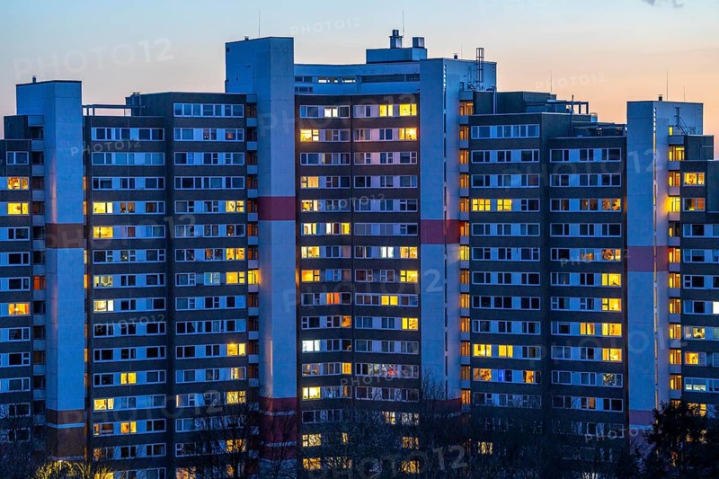 High-rise buildings in the Bensberg residential park, Bergisch-Gladbach, 18-storey housing estate with over 900 flats spread over 7 building complexes, dusk, illuminated windows, North Rhine-Westphalia, Germany, Europe