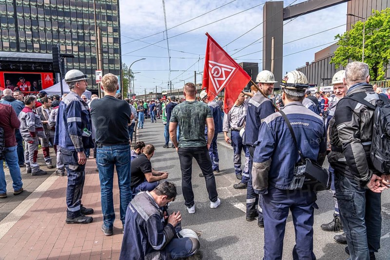 Steelworkers at a demonstration in front of the headquarters of ThyssenKrupp Steel Europe in Duisburg, against massive job cuts, after the participation of a foreign investor in the group, in the background the Oxygen steelworks, Duisburg North Rhine-Westphalia, Germany, Europe