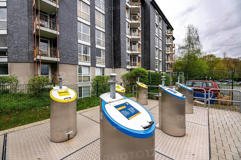 Underground waste disposal system, waste columns for different types of waste, in underground collection containers, at a residential complex in Bochum, North Rhine-Westphalia, Germany, Europe