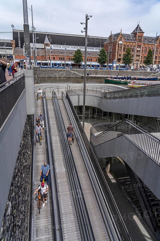 New bicycle car park at Amsterdam Central Station, Stationsplein, space for around 7000 bicycles, largest in Amsterdam, digitally monitored, underground, direct connection to the station and metro, Netherlands, escalators lead to the bicycle garage, Netherlands