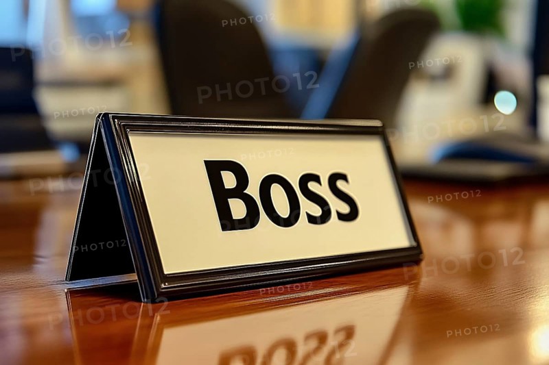 Desk sign with text 'Boss' on desk in office. Generative Ai, AI generated