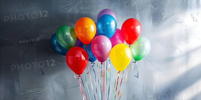 AI generated cluster of vibrant helium balloons floating against a grey background