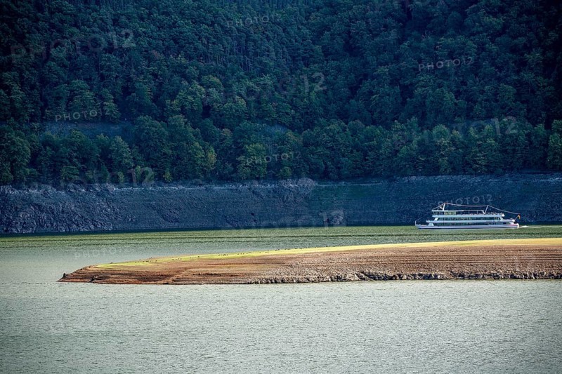 The Edersee, near Waldeck, the third largest reservoir in Germany, currently has only just under 13% of its normal level, the lake was last full in May 2022, dried up due to lack of rain, excursion boat Edersee Star, the water level is a good 25 metres below the normal level, Hesse, Germany, Europe