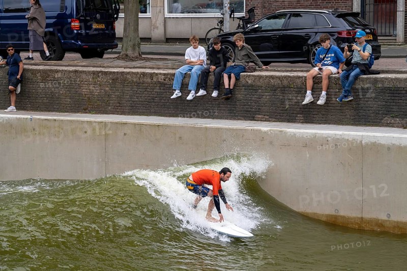 Surfing facility in the city centre of Rotterdam, Rif010, supposedly the world's first wave facility for surfers in a city, in the Steigersgracht, a 130 metre long and 21 metre wide wave pool was built in the existing canal, waves up to 1.5 metres high can be generated, every 7 seconds a wave breaks for the surfers, the 4.5 million litres in the pool, water is moved by 8 wave machines, Netherlands