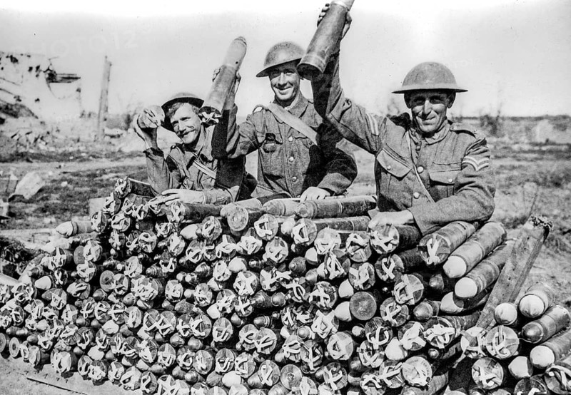 1917 British WWI artillery soldiers posing with field gun shells during World War One at Zillebeke, West Flanders, Belgium, Europe